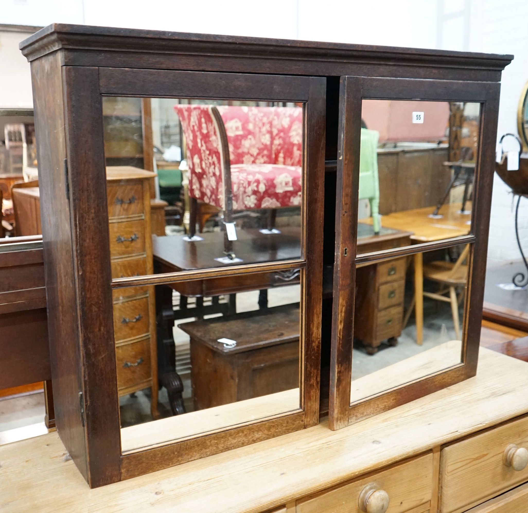 A Victorian mirrored two door wall cabinet, width 102cm, depth 27cm, height 77cm